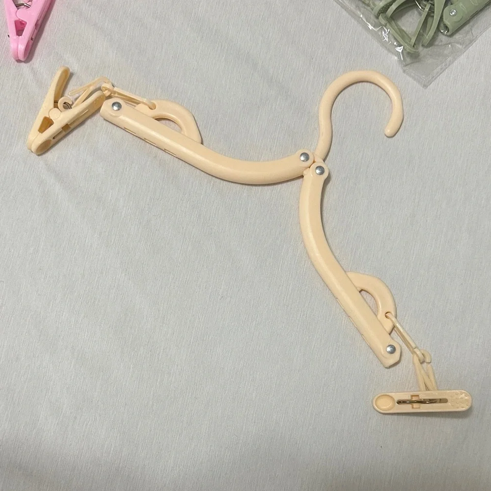 Foldable Clothes Hangers Set in Pink, Blue, Green, and Tan